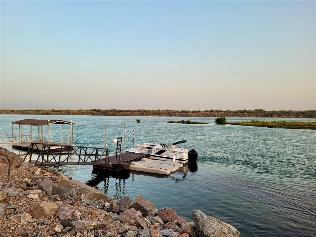 2710 Colorado River Road Blythe, CA 92225 - Photo 42 of 43 a view of a lake with couches and city view