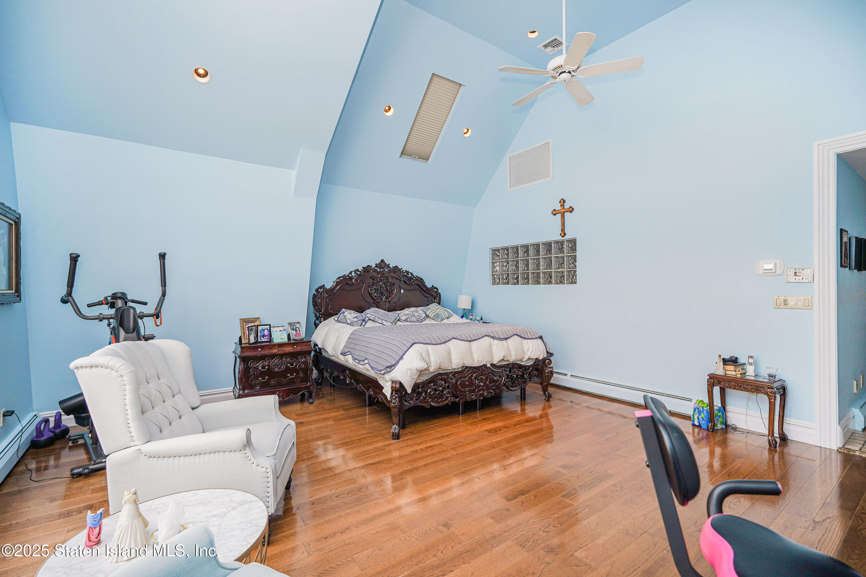 44 Zephyr Avenue Staten Island, NY 10312 - Photo 24 of 54 a bedroom with a bed couch and a window