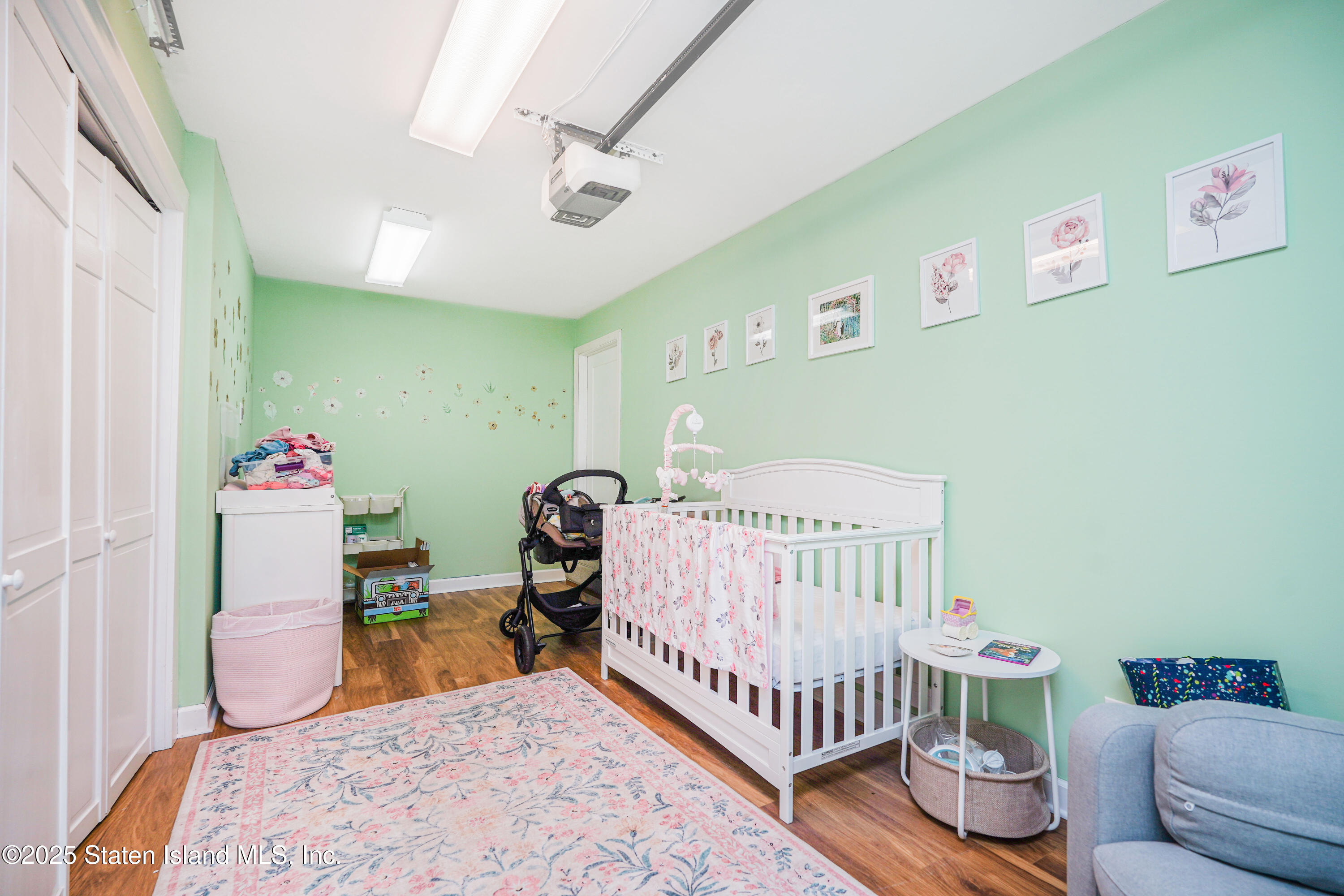 44 Zephyr Avenue Staten Island, NY 10312 - Photo 35 of 54 a bedroom with furniture and a bed