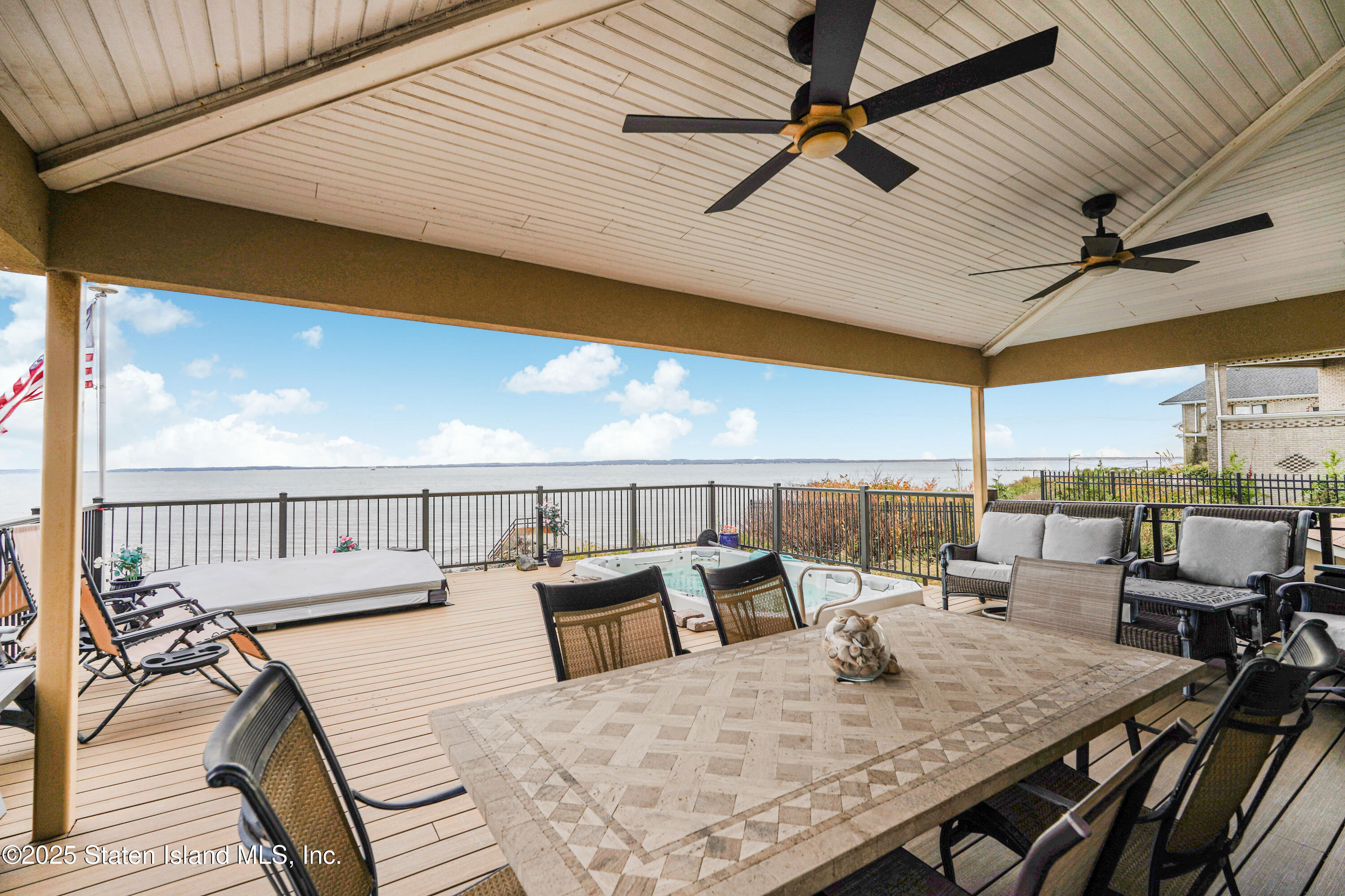 44 Zephyr Avenue Staten Island, NY 10312 - Photo 48 of 54 a view of a dining room with furniture window and outside view