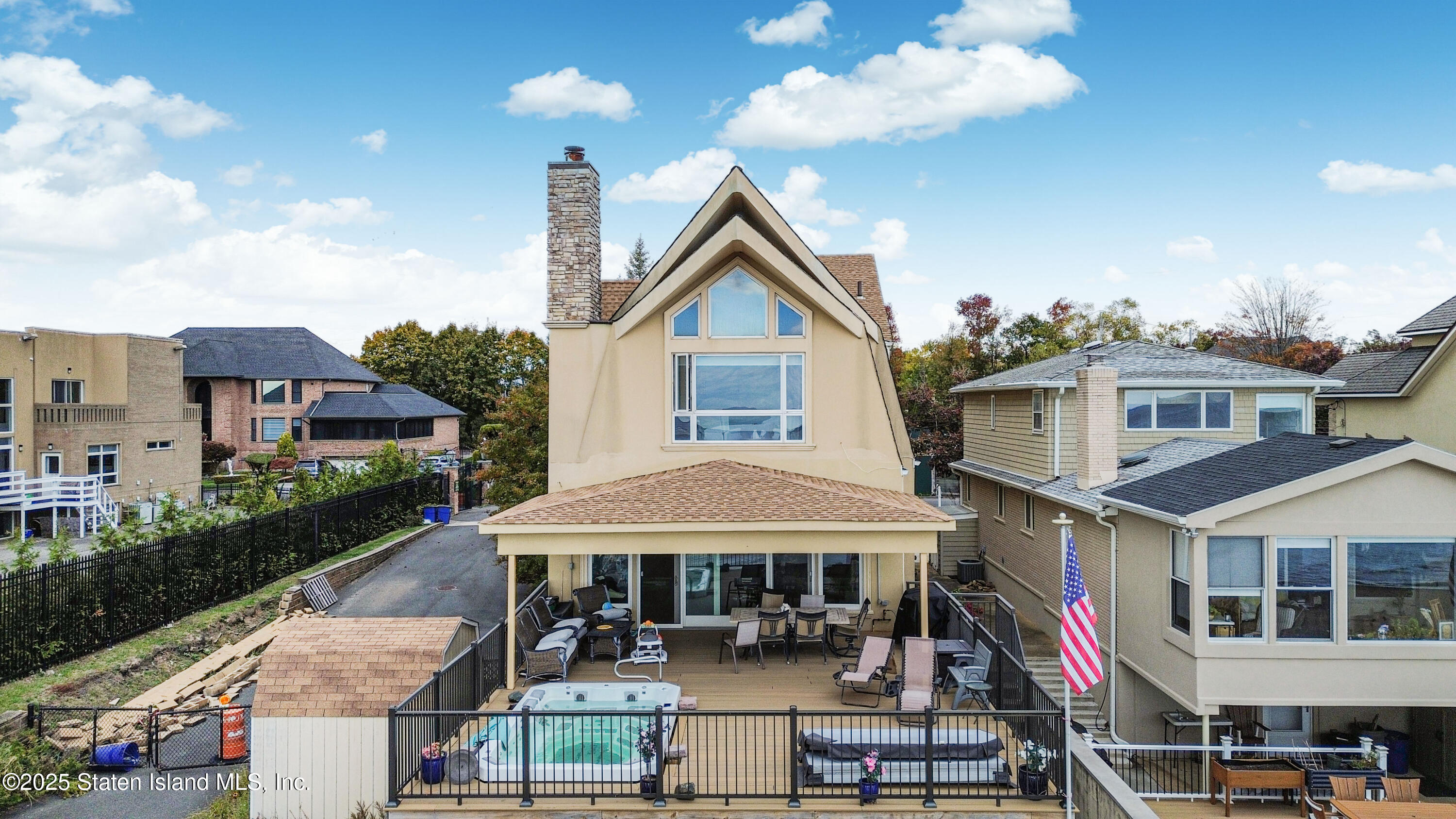 44 Zephyr Avenue Staten Island, NY 10312 - Photo 54 of 54 a front view of a residential apartment building with a yard