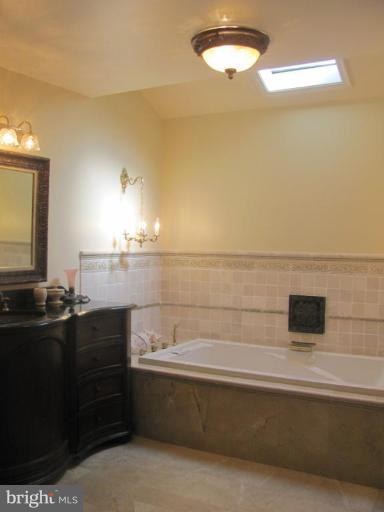 1110 Timber Trail Road Towson, MD 21286 - Photo 5 of 29 CUSTOM VANIETY, TWO PERSON TUB, MARBLE TILE