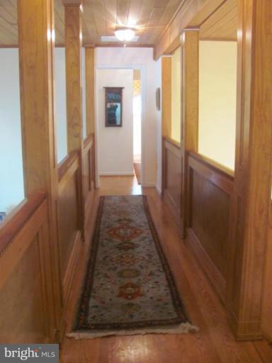 1110 Timber Trail Road Towson, MD 21286 - Photo 8 of 29 UPPER LEVEL HALLWAY WOOD FLRS.& MOLDINGS