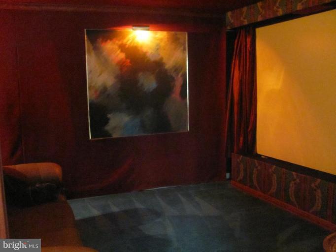1110 Timber Trail Road Towson, MD 21286 - Photo 9 of 29 MEDIA ROOM MOVIE SCREEN & PROJECTOR