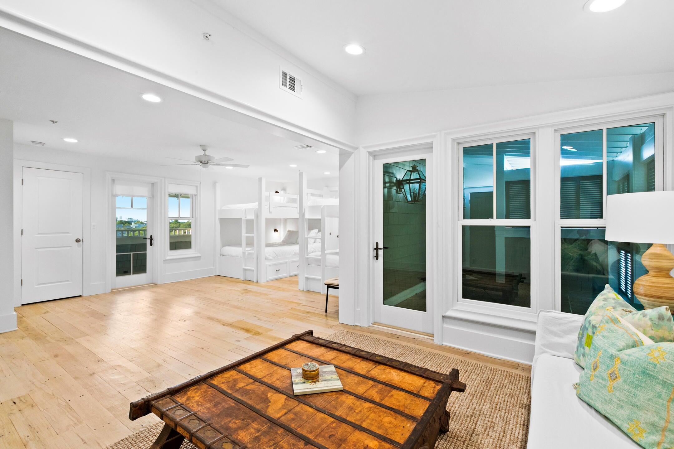 23 Johnstown Lane Inlet Beach, FL 32461 - Photo 17 of 35 a view of a living room and floor to ceiling window or kitchen