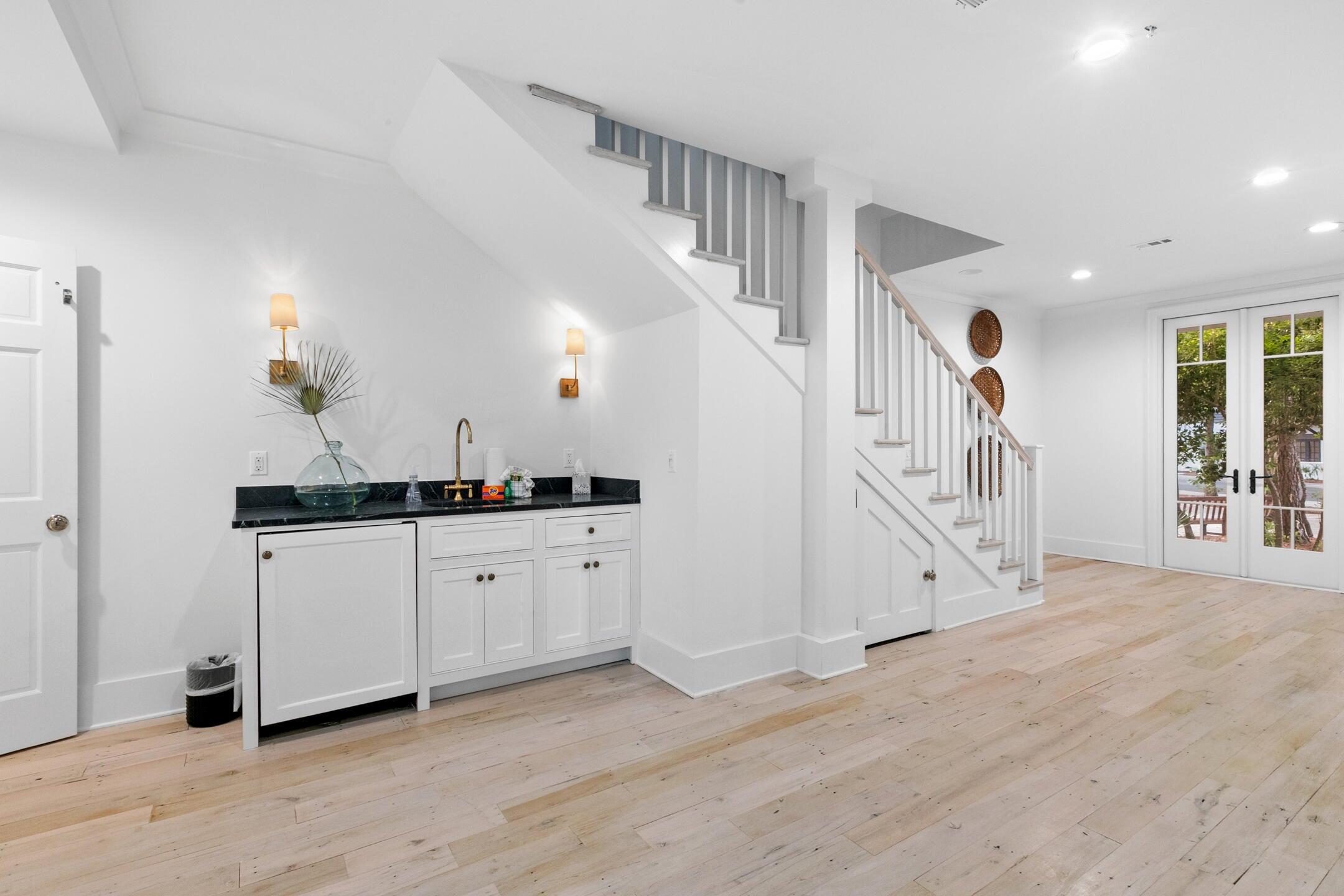 23 Johnstown Lane Inlet Beach, FL 32461 - Photo 23 of 35 a room with white cabinets and sink