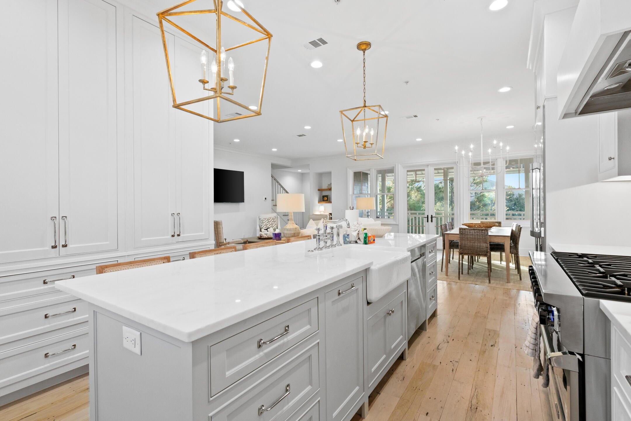 23 Johnstown Lane Inlet Beach, FL 32461 - Photo 27 of 35 a kitchen with a sink cabinets and wooden floor
