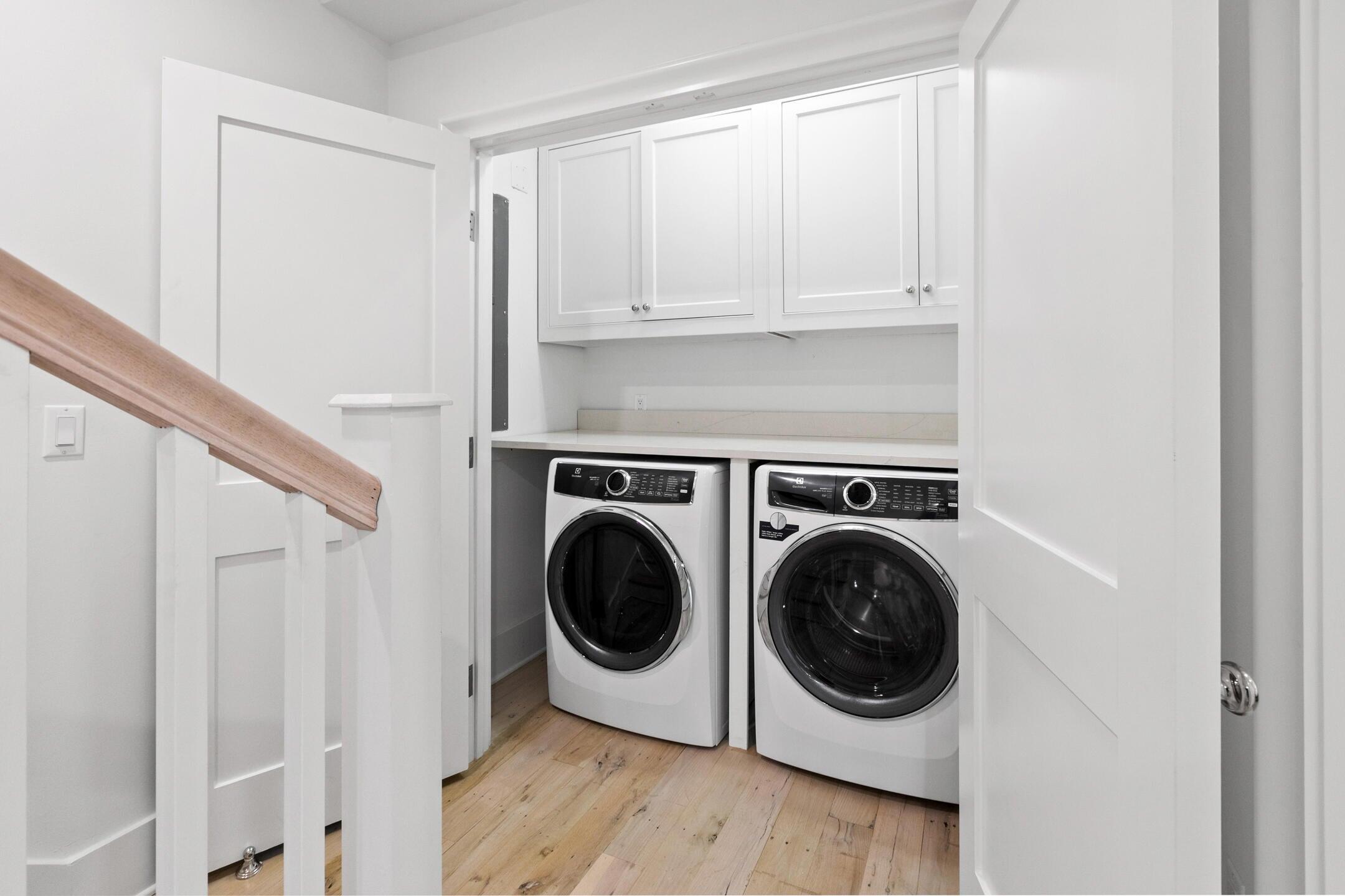 23 Johnstown Lane Inlet Beach, FL 32461 - Photo 28 of 35 a utility room with wooden floor washer and dryer