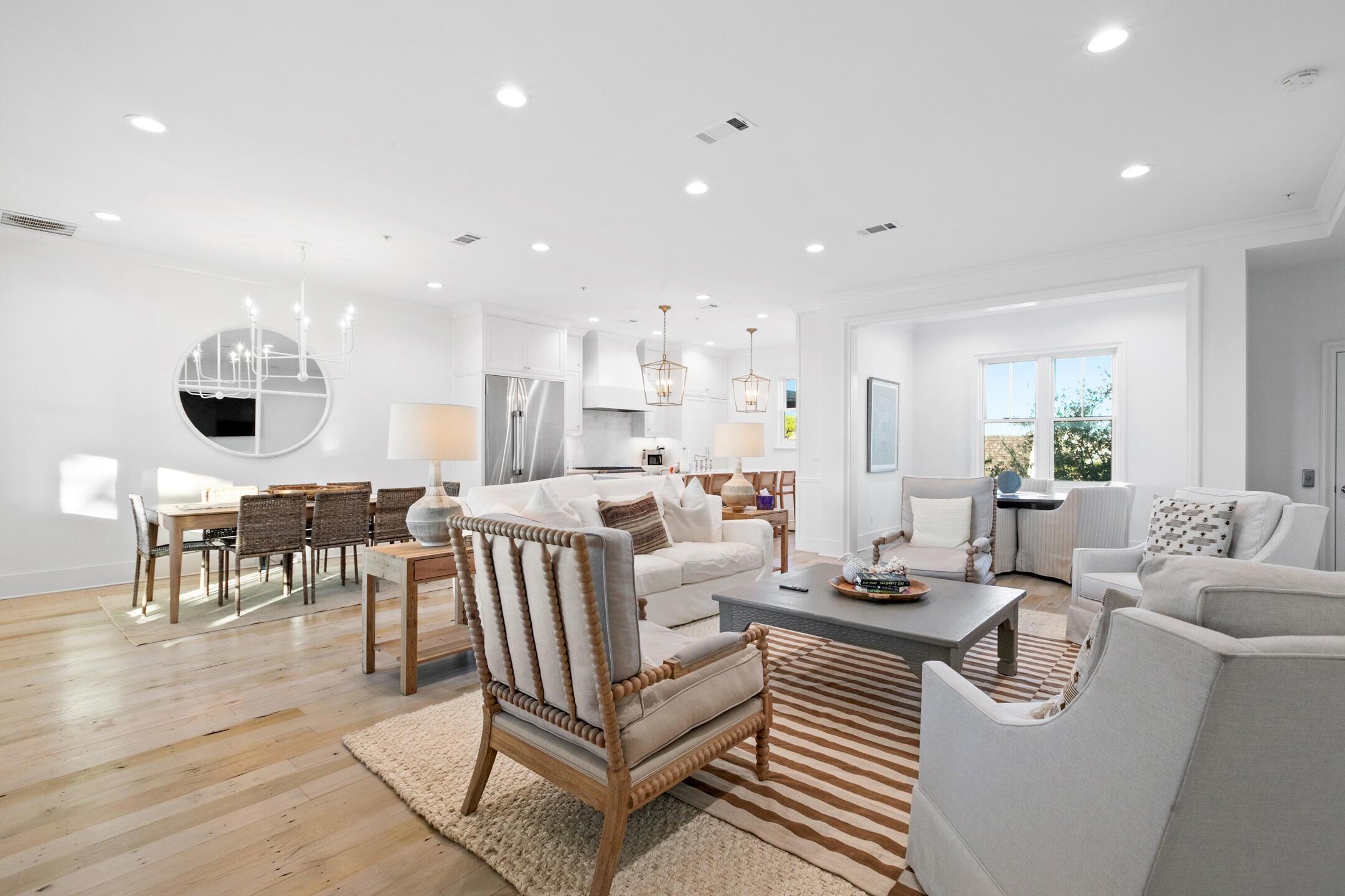 23 Johnstown Lane Inlet Beach, FL 32461 - Photo 29 of 35 a living room with furniture and a dining table with wooden floor