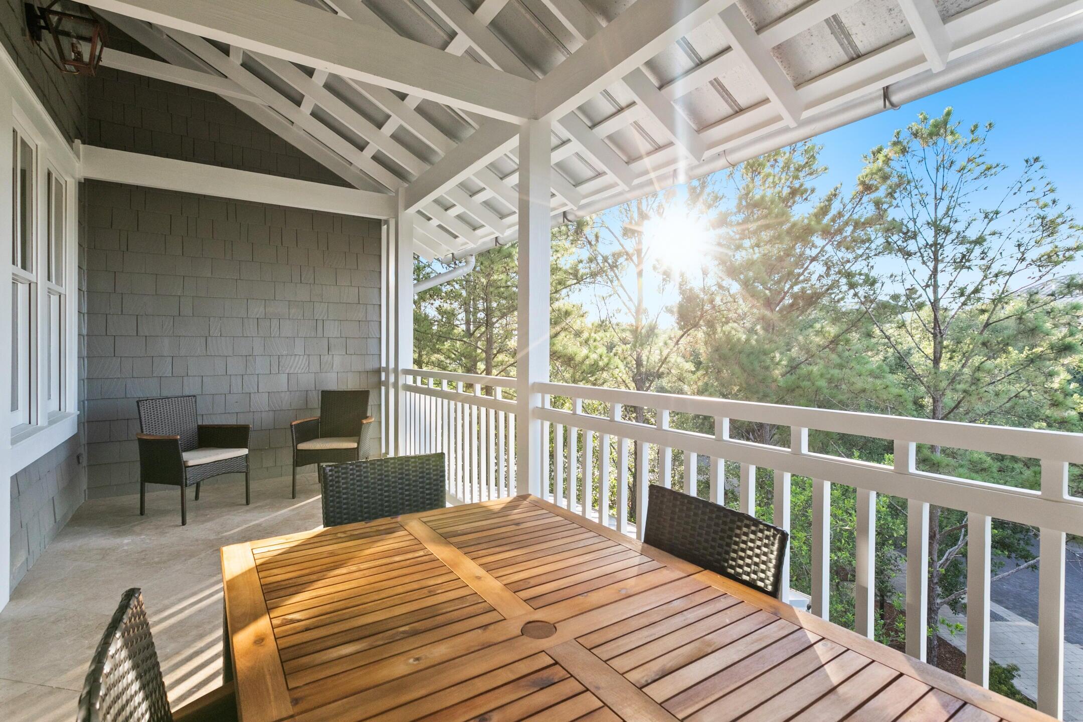 23 Johnstown Lane Inlet Beach, FL 32461 - Photo 3 of 35 a bedroom with a bed and wooden floor