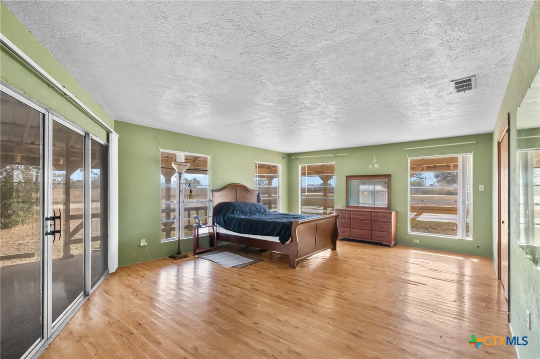 1720 Lower Mission Valley Road Victoria, TX 77905 - Photo 5 of 30 a living room with furniture and a window