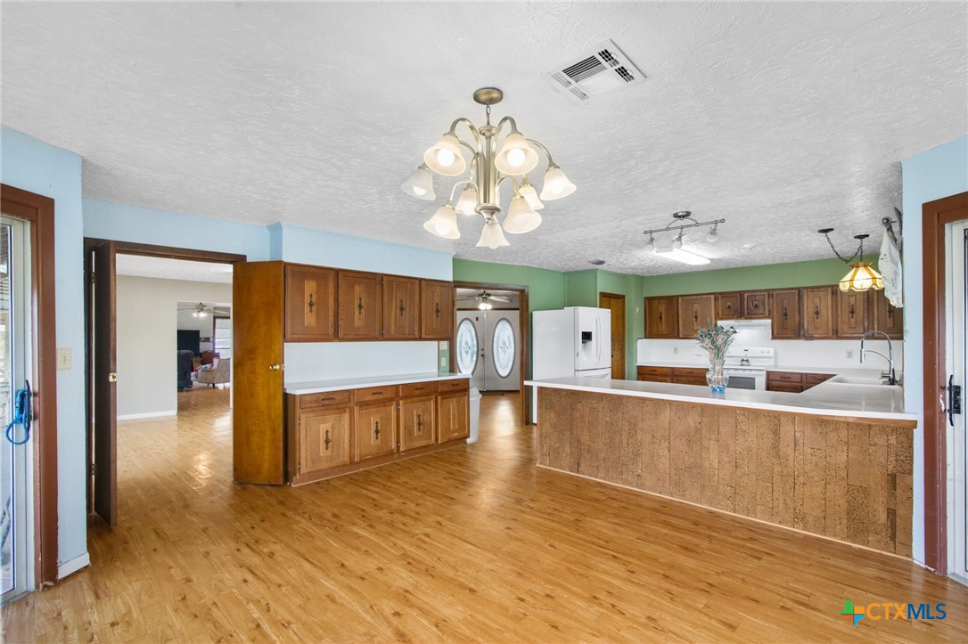 1720 Lower Mission Valley Road Victoria, TX 77905 - Photo 10 of 30 a view of a living room and kitchen
