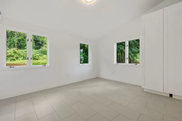 an empty room with windows