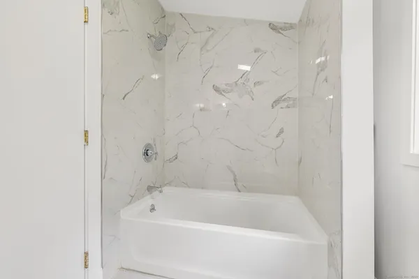 a bathroom with a bathtub