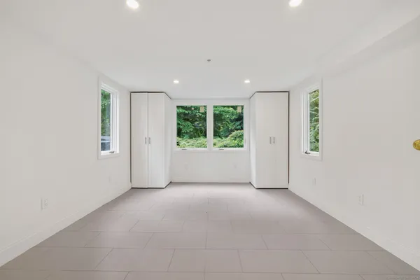 an empty room with windows