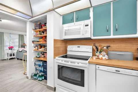 a utility room with washer and dryer