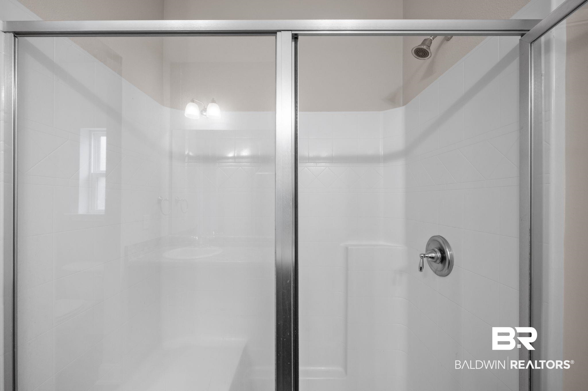 6903 Spaniel Drive, Unit B Spanish Fort, AL 36527 - Photo 14 of 28 Full bath featuring a stall shower
