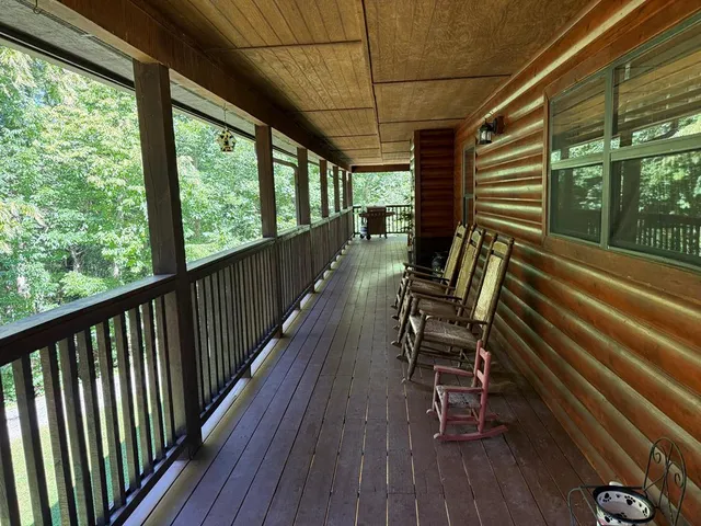 a view of chairs in wooden deck
