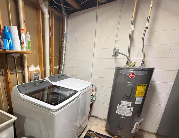 a utility room with dryer and washer