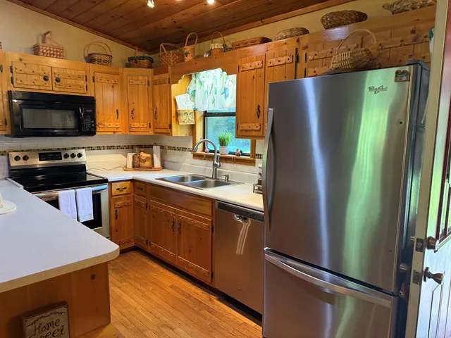 a view of a city with lush green forest