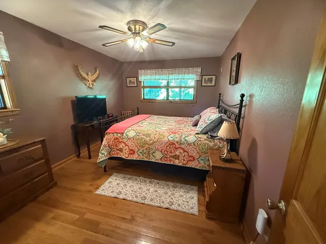 a bathroom with a sink a mirror and a shower