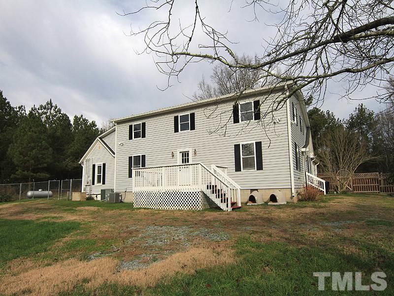 2216 Ellis Chapel Road Bahama, NC 27503 - Photo 13 of 13 a view of a house with backyard