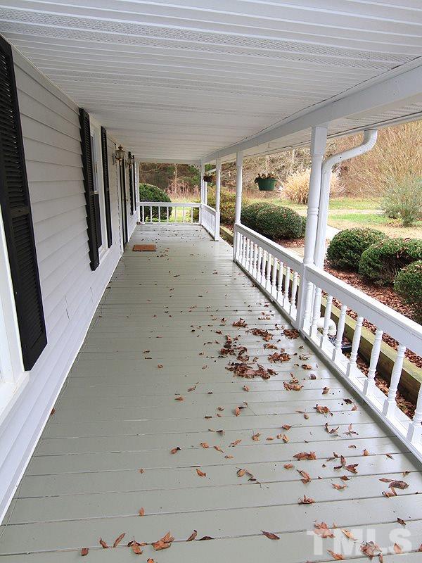 2216 Ellis Chapel Road Bahama, NC 27503 - Photo 3 of 13 a view of a porch