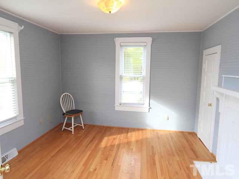 2216 Ellis Chapel Road Bahama, NC 27503 - Photo 8 of 13 a room with a window and a chair