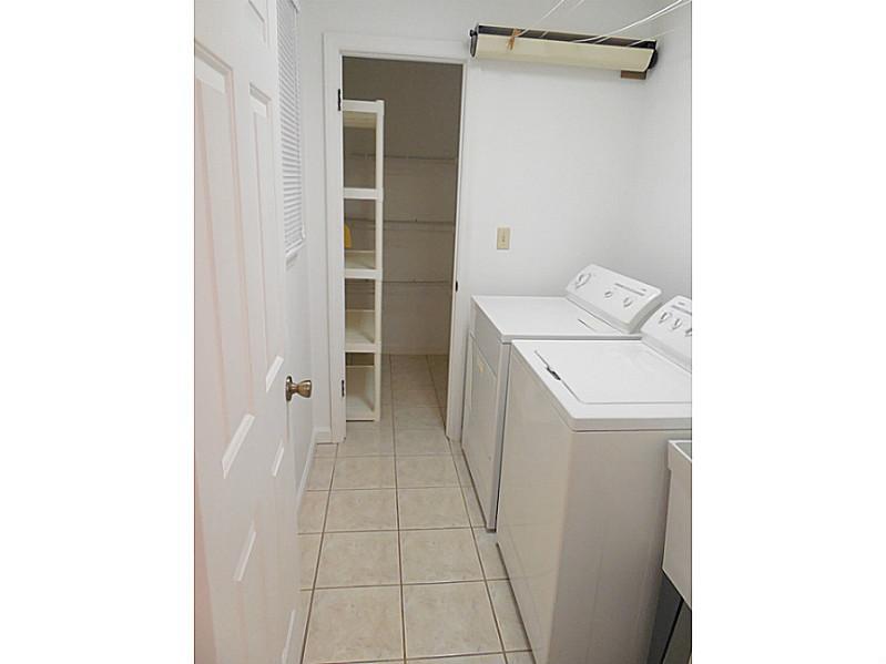 1000 Segar Road Mt. Lebanon, PA 15243 - Photo 21 of 25 Other. The first floor laundry room is complete with a washer and dryer and tons of storage.