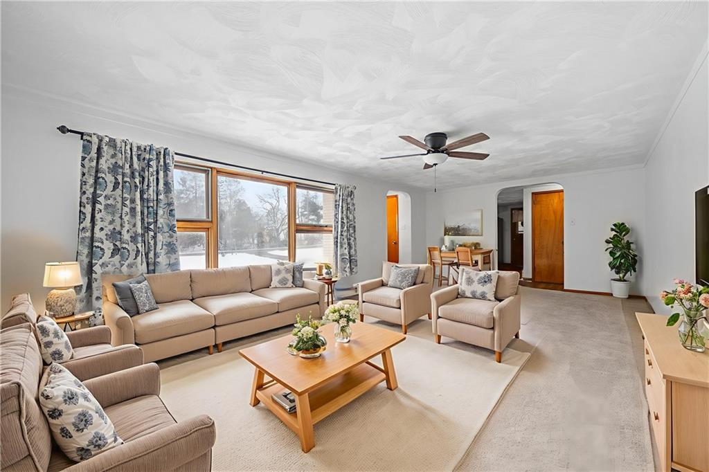176 McMichael Road Pittsburgh, PA 15205 - Photo 11 of 32 a living room with furniture and a large window