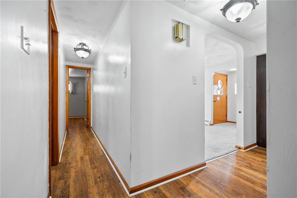 176 McMichael Road Pittsburgh, PA 15205 - Photo 14 of 32 a view of a hallway with wooden floor