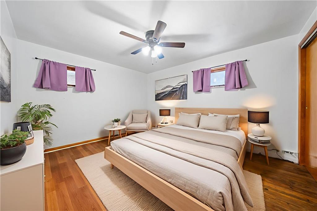 176 McMichael Road Pittsburgh, PA 15205 - Photo 15 of 32 a bedroom with a bed and a chandelier