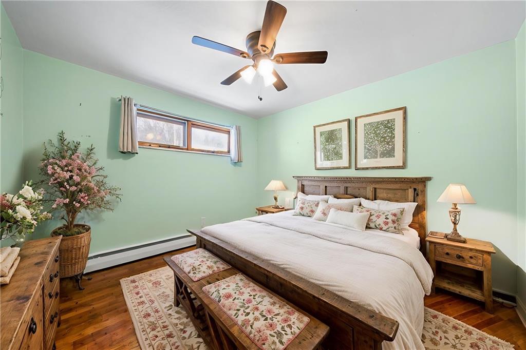 176 McMichael Road Pittsburgh, PA 15205 - Photo 17 of 32 a bedroom with a bed and a window