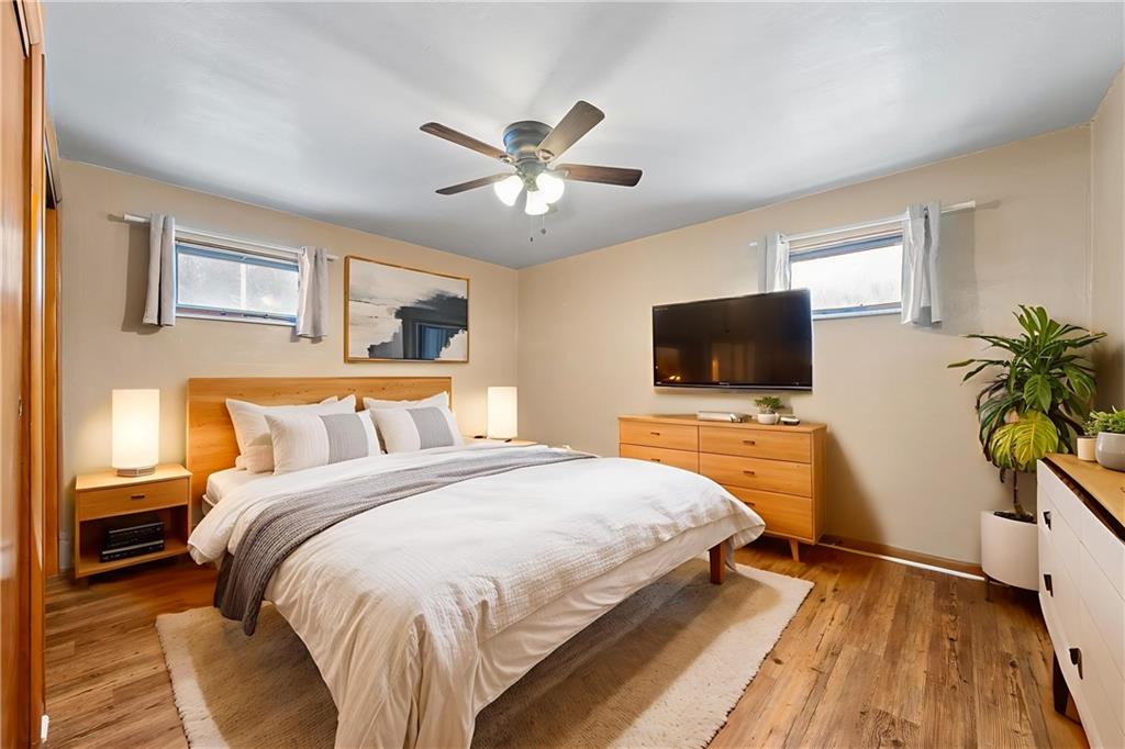 176 McMichael Road Pittsburgh, PA 15205 - Photo 18 of 32 a bedroom with a bed and a flat screen tv