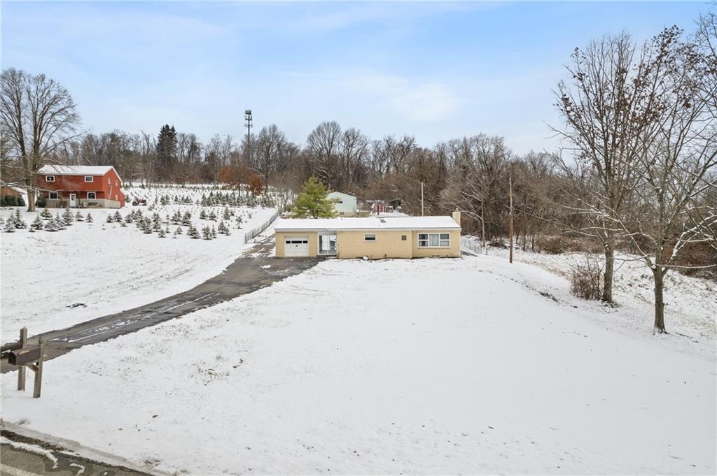 176 McMichael Road Pittsburgh, PA 15205 - Photo 4 of 32 a view of a city street and snow