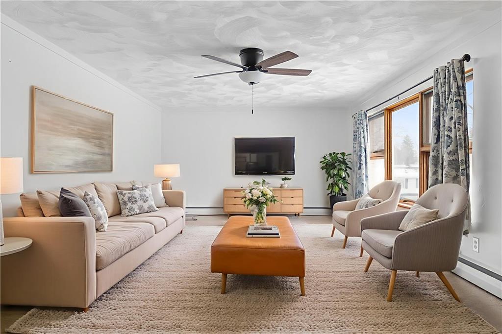 176 McMichael Road Pittsburgh, PA 15205 - Photo 10 of 32 a living room with furniture and a flat screen tv
