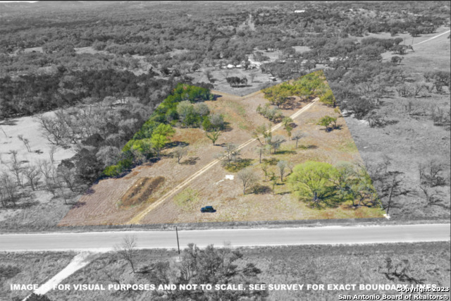 Tbd Clearwater Canyon Ranch Bandera, TX 78003 - Photo 1 of 12 a view of a garden with wooden fence