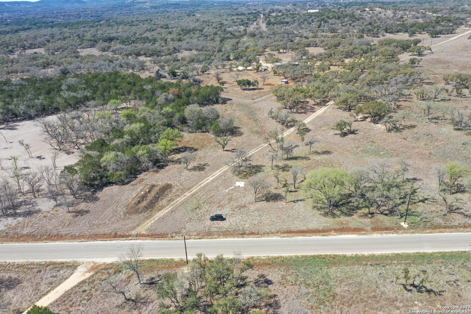 Tbd Clearwater Canyon Ranch Bandera, TX 78003 - Photo 2 of 12 a view of a yard with wooden fence