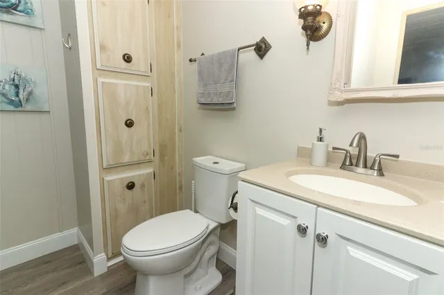 a bathroom with a sink and toilet