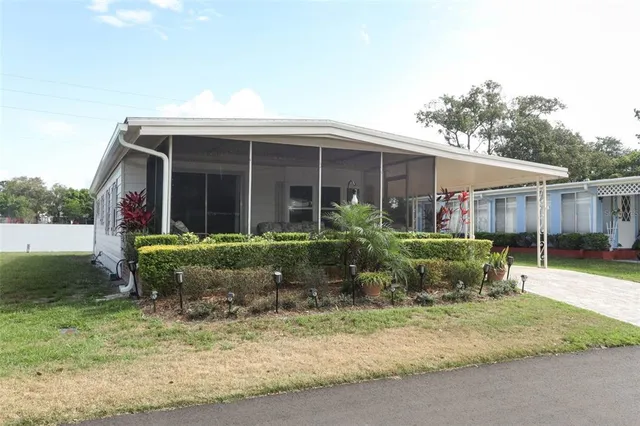 a view of a house with a garden