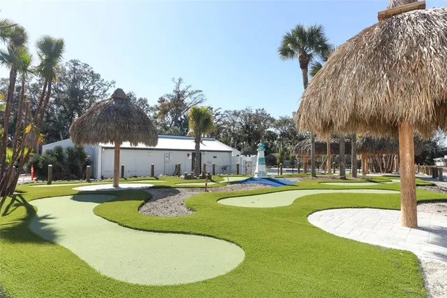 a view of a park with large trees