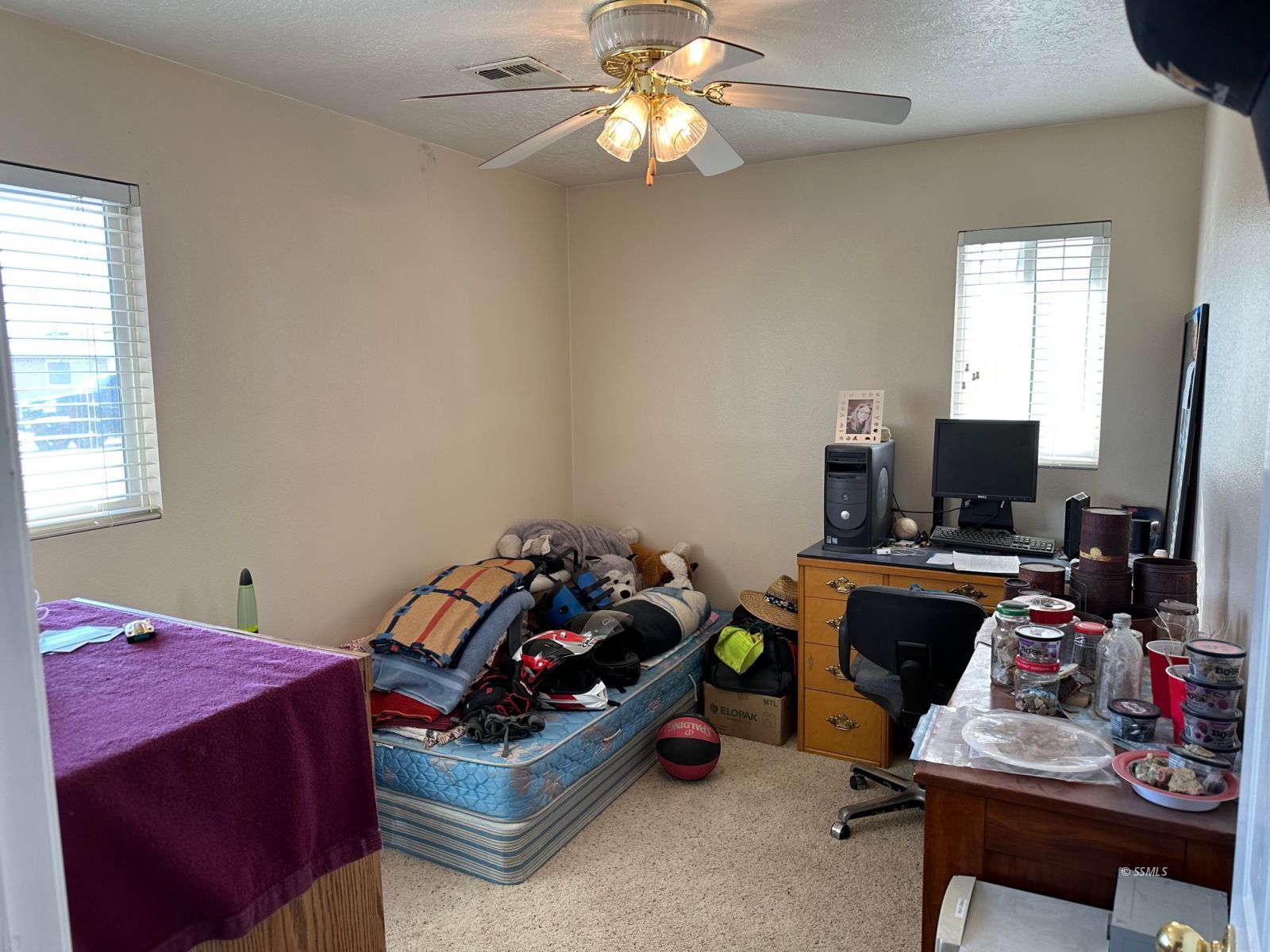 237 South Desert Candles Street Ridgecrest, CA 93555 - Photo 12 of 23 a bedroom with a bed and a window