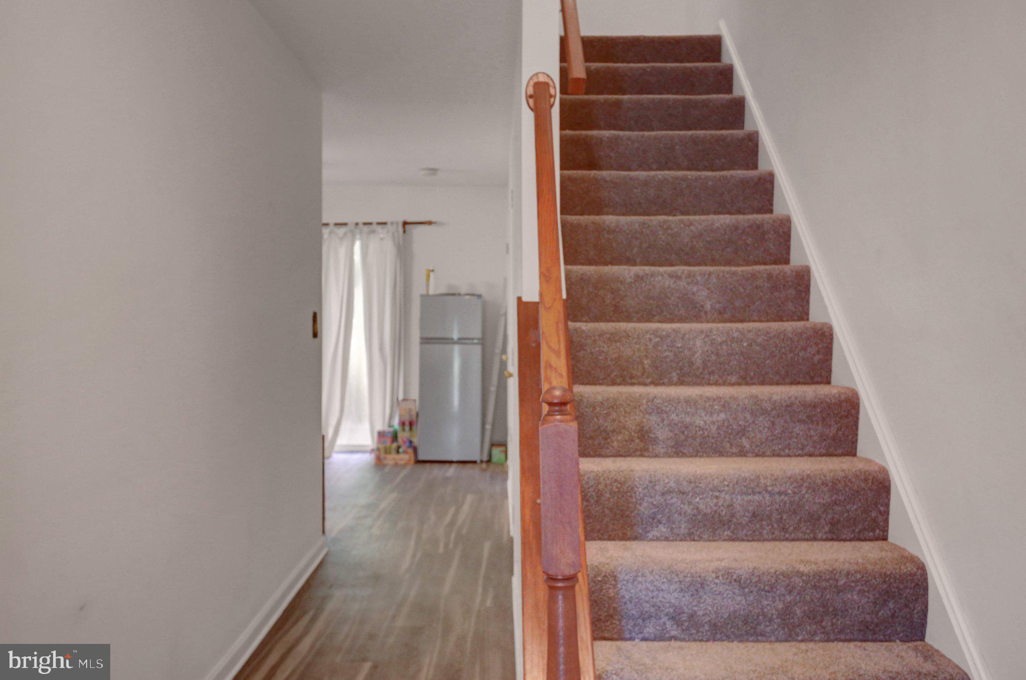 1557 Brechbill Road Chambersburg, PA 17202 - Photo 11 of 33 Staircase leading to 2nd floor (main level).