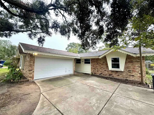 a house with a tree in front of it