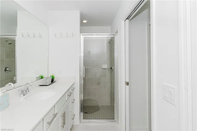 a bathroom with a sink and mirror