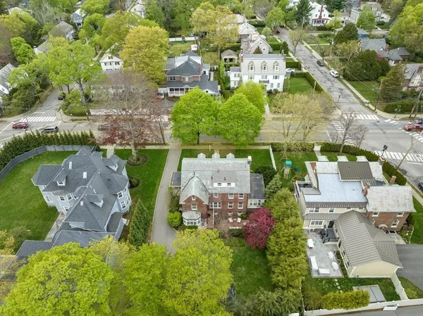 an aerial view of a house with outdoor space sitting space