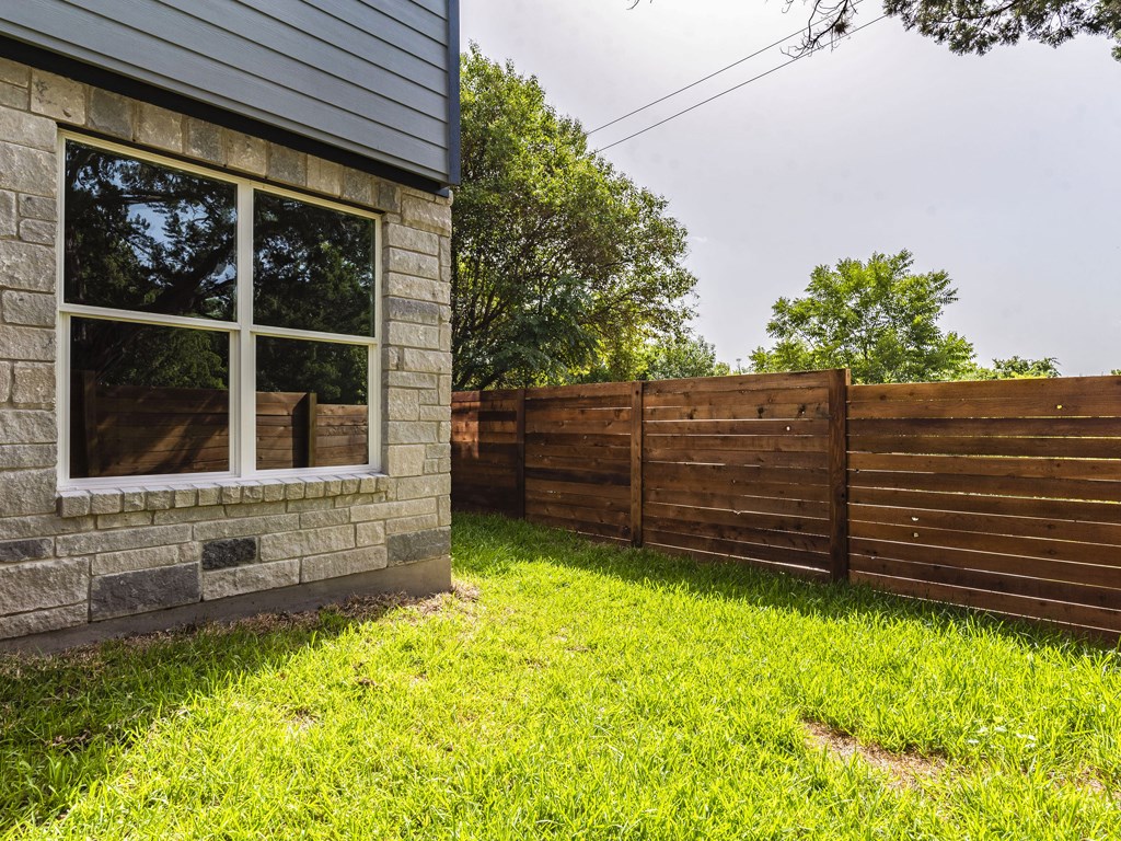 406 Post Rd Drive, Unit 1 Austin, TX 78704 - Photo 22 of 30 fully fenced in yard providing privacy