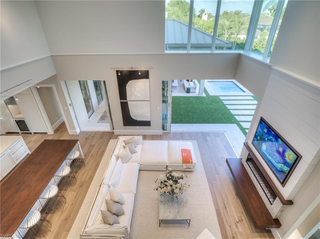 6598 Ridgewood Drive Naples, FL 34108 - Photo 13 of 34 Great room view from loft