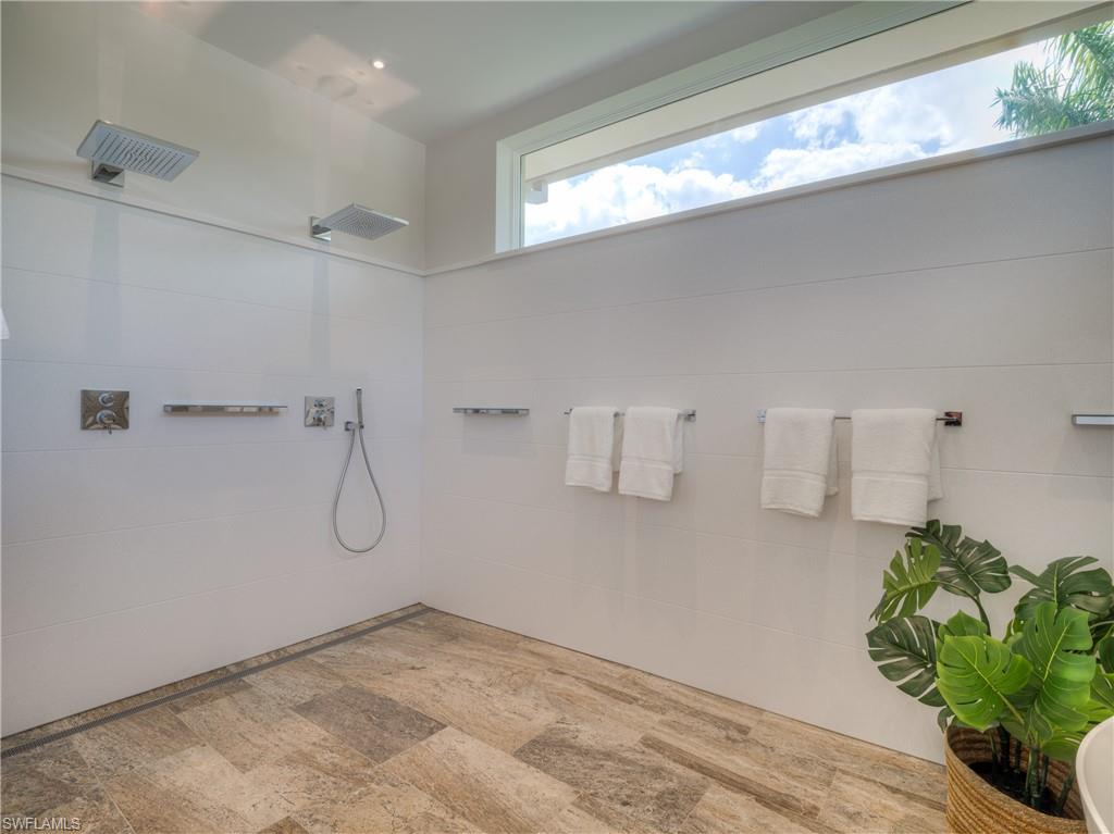6598 Ridgewood Drive Naples, FL 34108 - Photo 21 of 34 Master Bath Wet Area