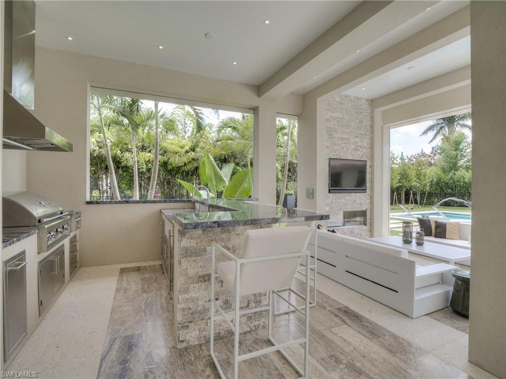 6598 Ridgewood Drive Naples, FL 34108 - Photo 31 of 34 Outdoor Living